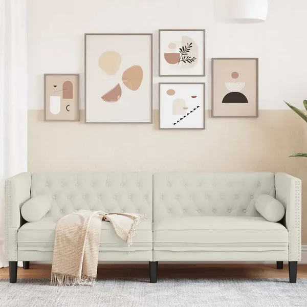 Canapé Chesterfield avec traversins 3 places crème velours