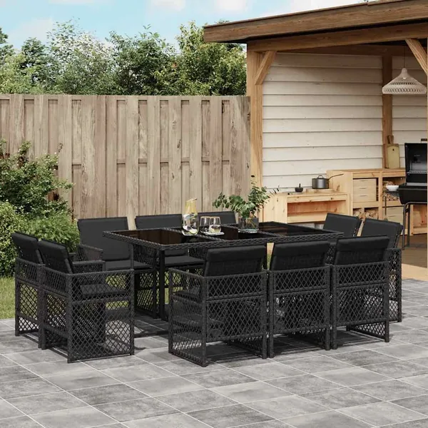 Ensemble à manger de jardin 11 pcs coussins noir résine tressée