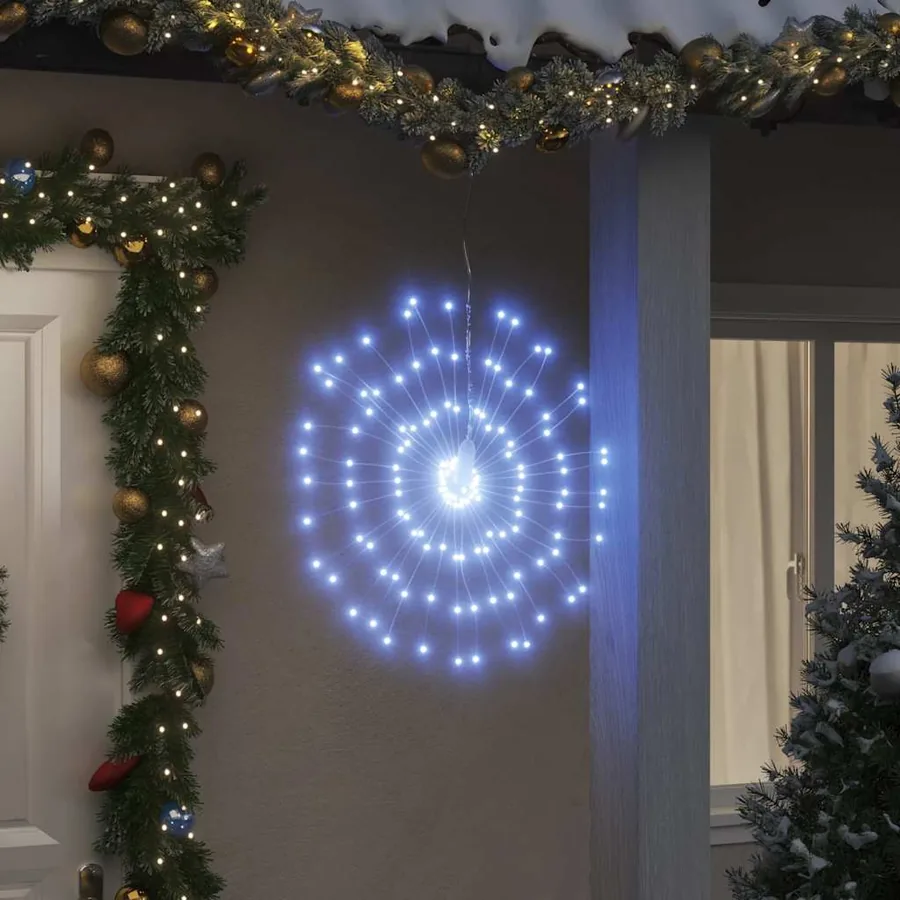 Étoile rayonnante de Noël 140 LED blanc froid 17 cm